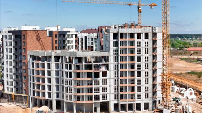 Хід будівництва ЖК «Синергія Сіті» у травні 2026: активні роботи у готових будинках та старт розвитку 8 черги